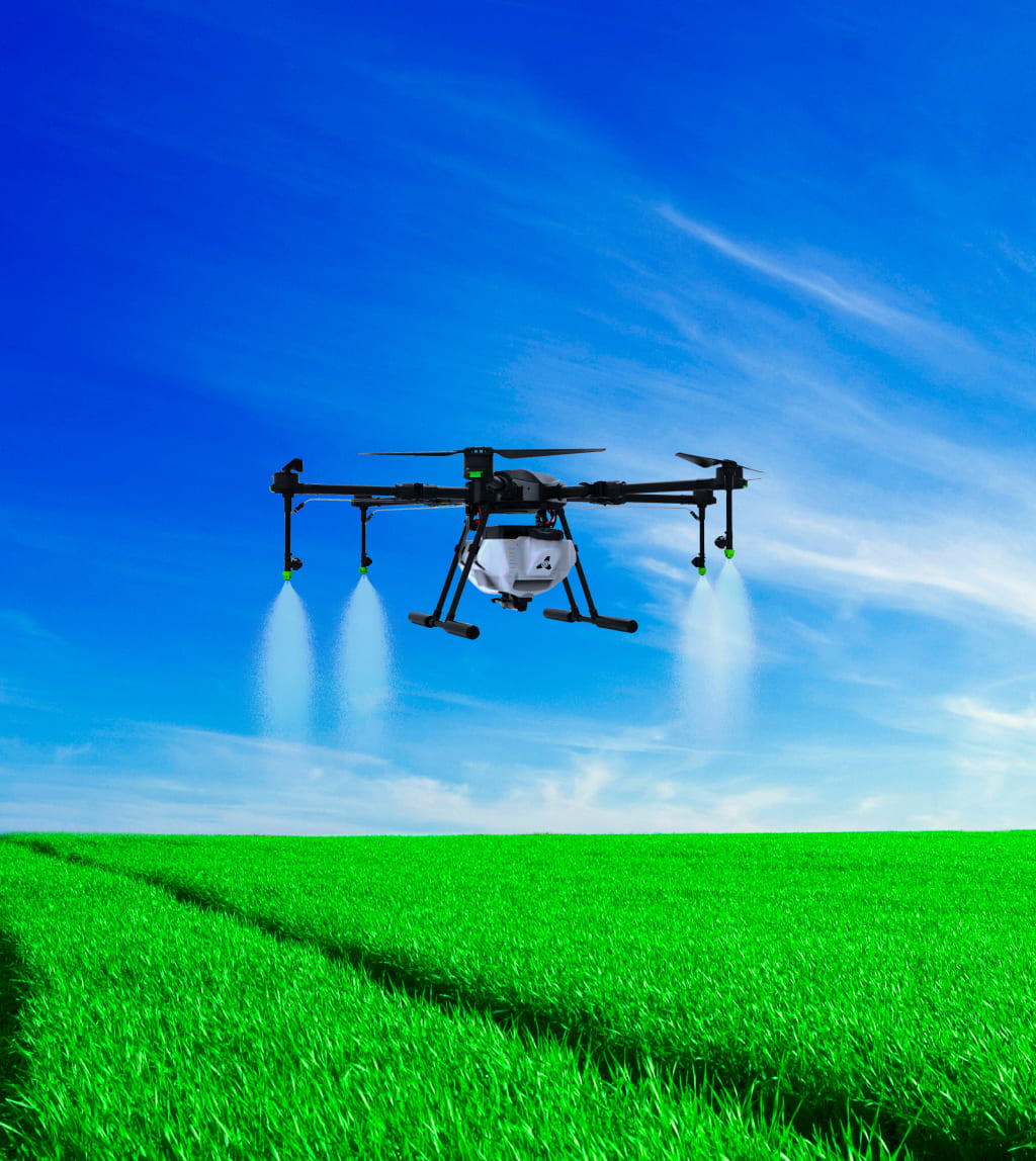image of kisaan drone spraying chemicals.